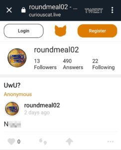 A screenshot of a post on defunct Q&A site Curiouscat, made by Colwell under his "roundmeal02" account. The question asked is "UwU?" Colwell replies with the n-slur, redacted in the screenshot.